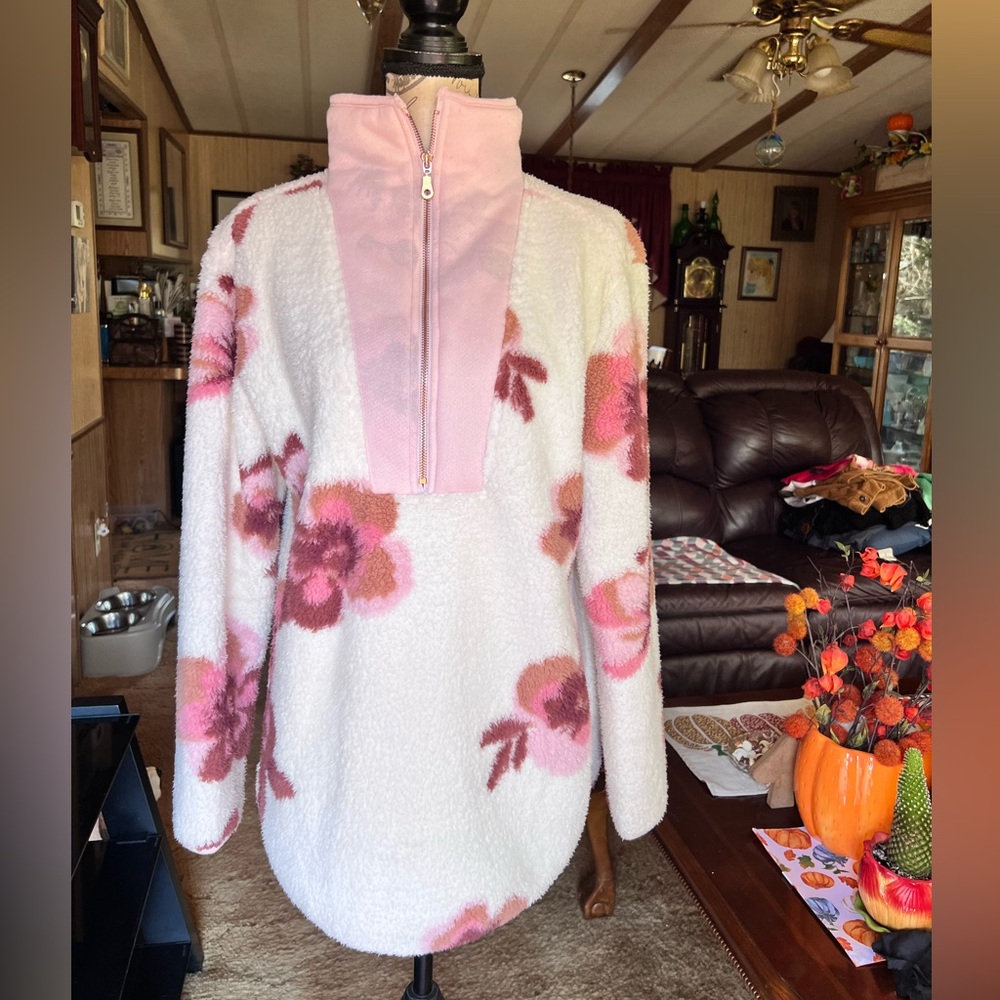 Women’s half zip fleece sherpa floral pullover. White with pink floral pattern.